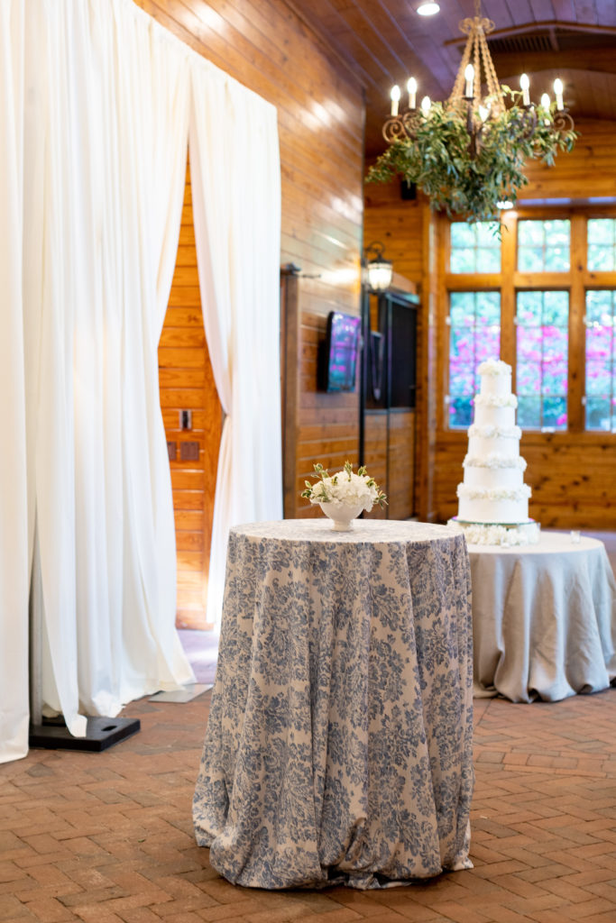 Interior Decorating featuring pipe and drape and the bride's cake