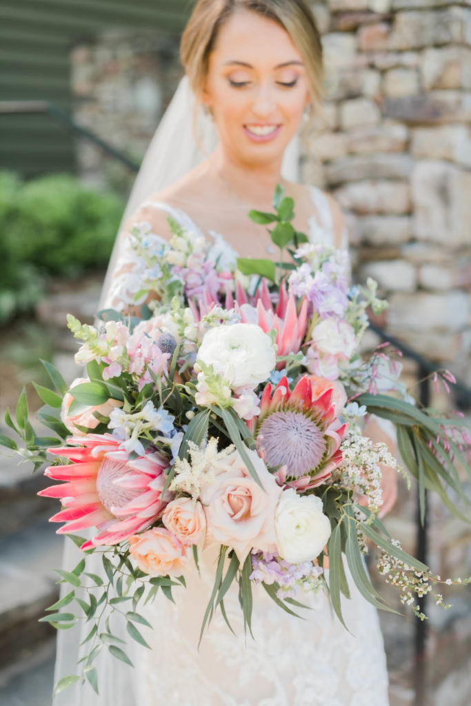 Bride and her bouquet at  windwood Equestrian. An event and wedding venue in Birmingham, AL.